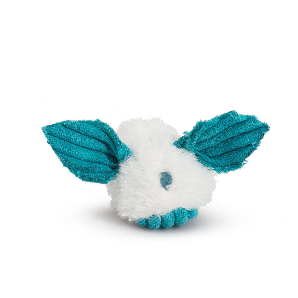 White and teal dog toy with a face on a white background.