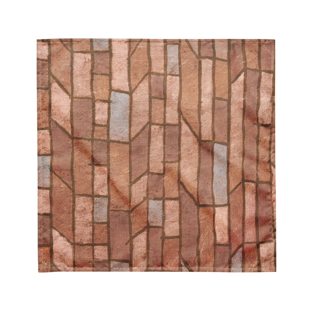 Bandana with a pattern of interlocking rectangular tiles in earthy tones on a white background.