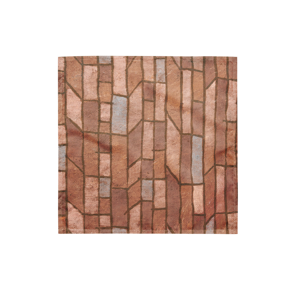 Bandana with a geometric pattern of brown and beige tiles on a white background.