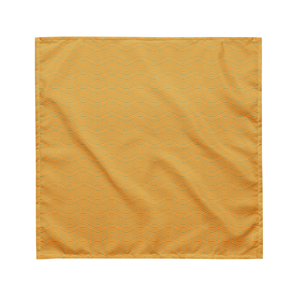 Orange fabric pet bandana with a subtle pattern on a white background.