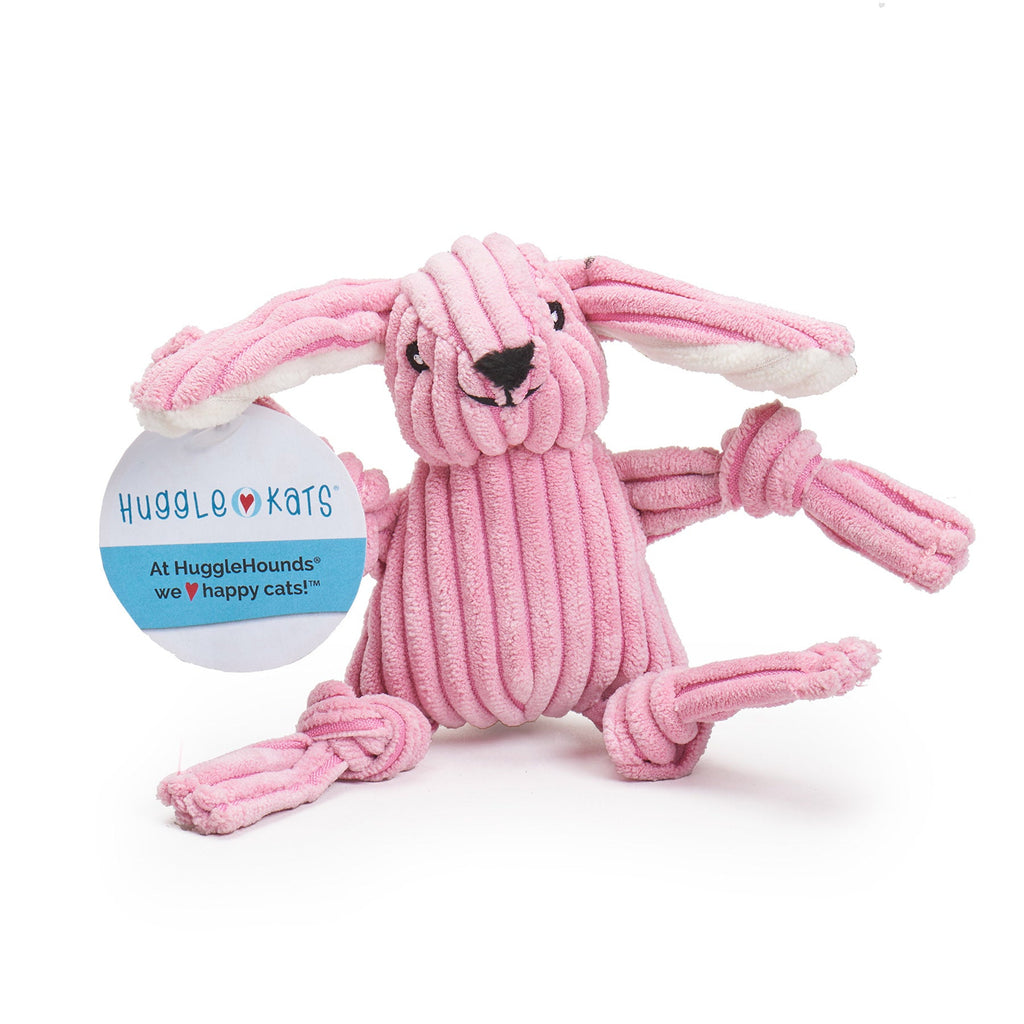 Pink bunny cat toy with a label on a white background.